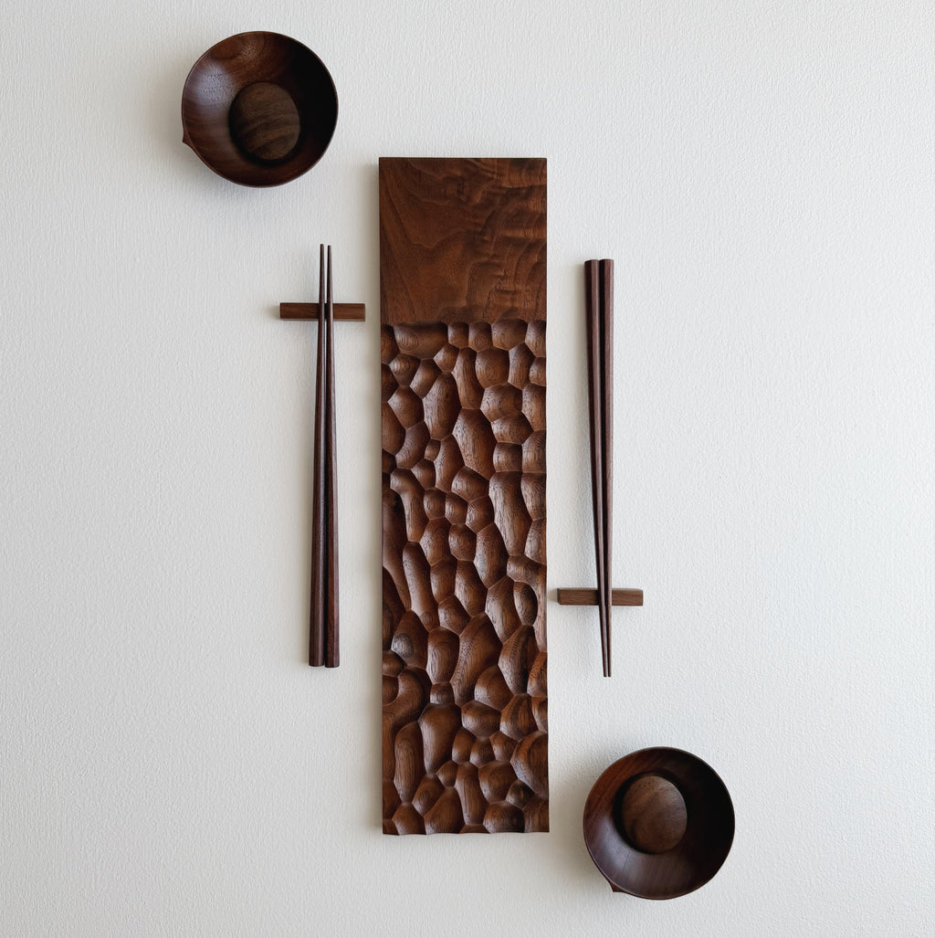 Sculpted long board eating set in walnut
