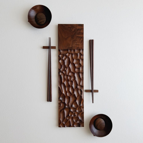 Sculpted long board eating set in walnut