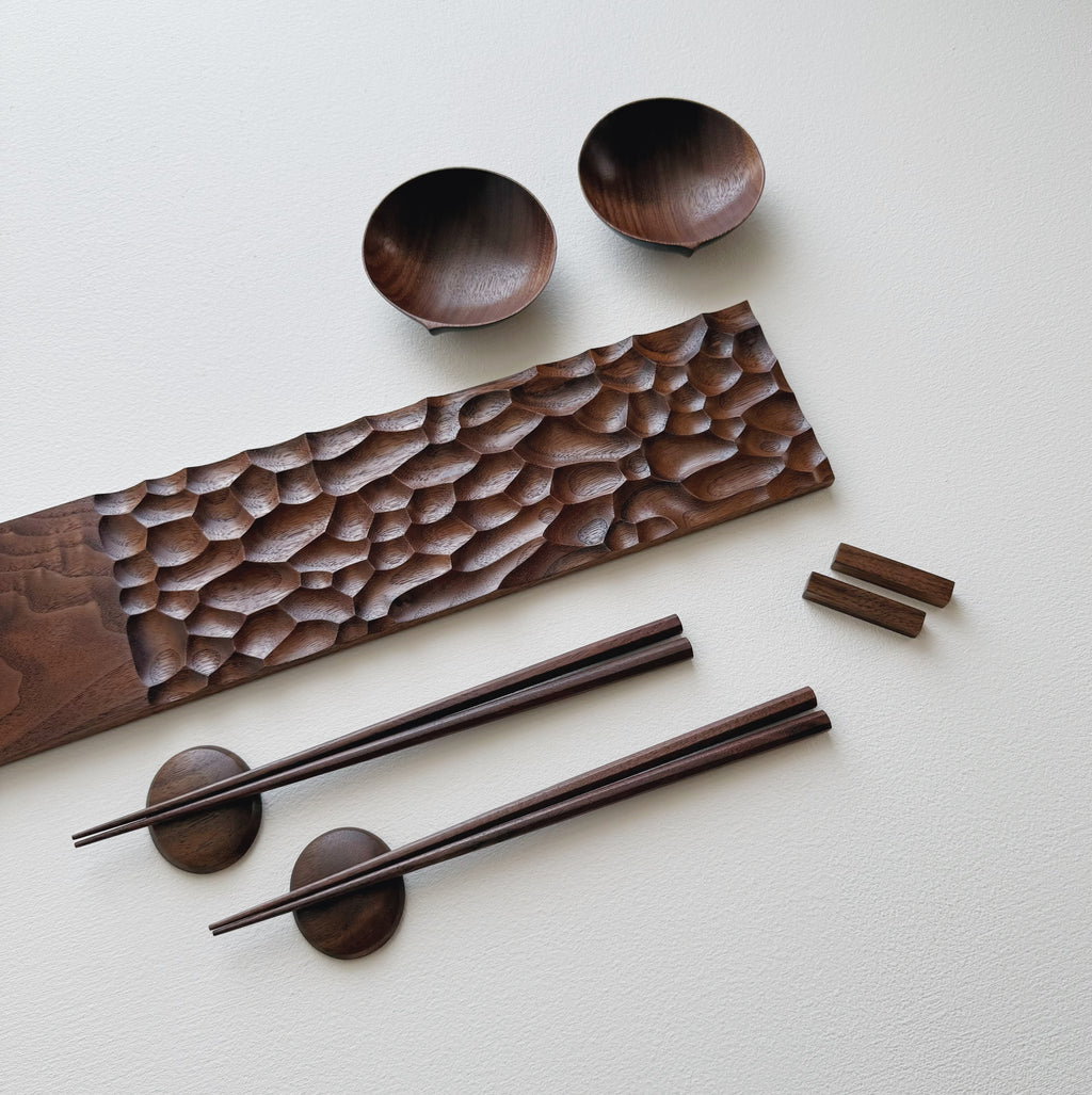 Sculpted long board eating set in walnut