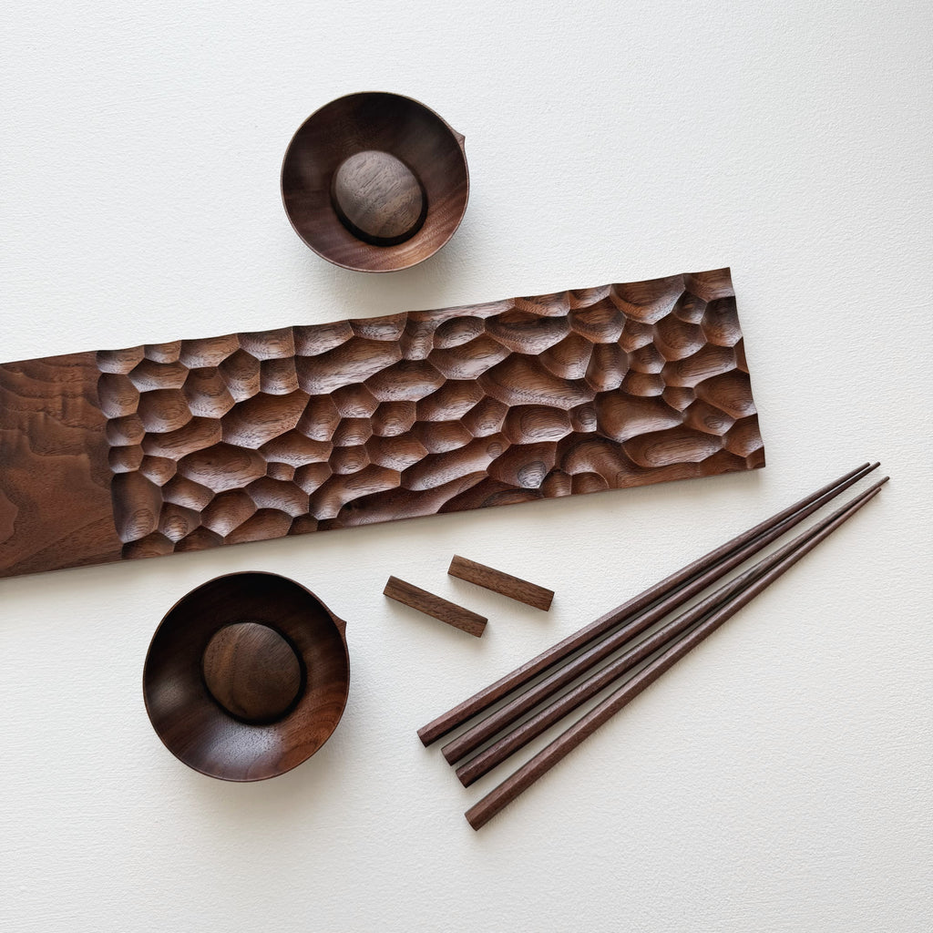 Sculpted long board eating set in walnut