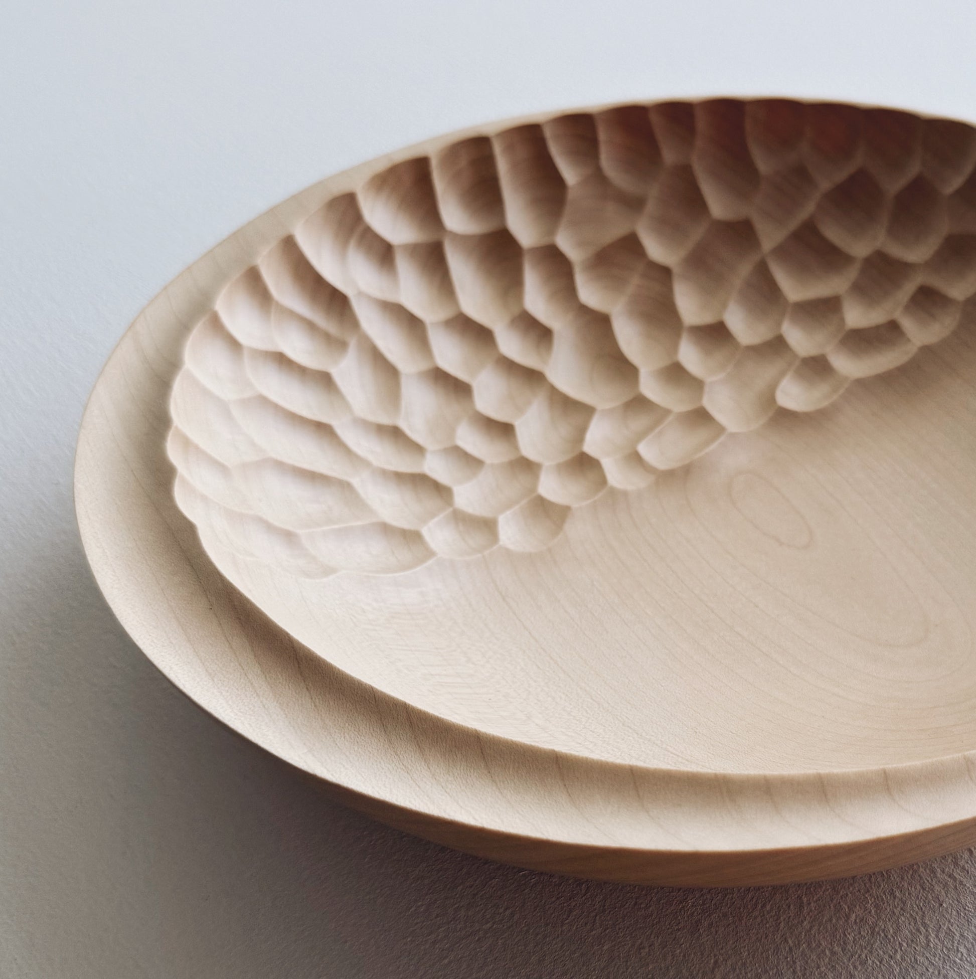 Cratered presentation bowl in sycamore