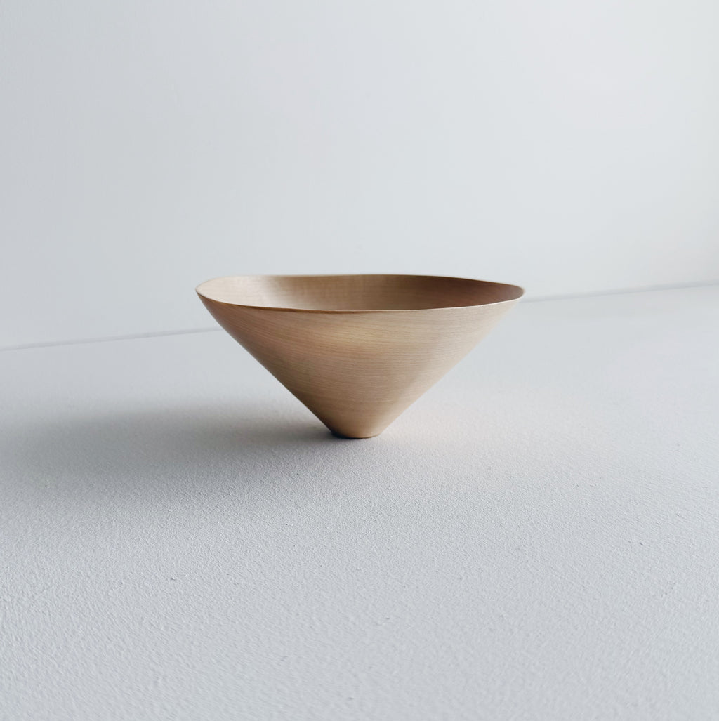Conical sculptural bowl