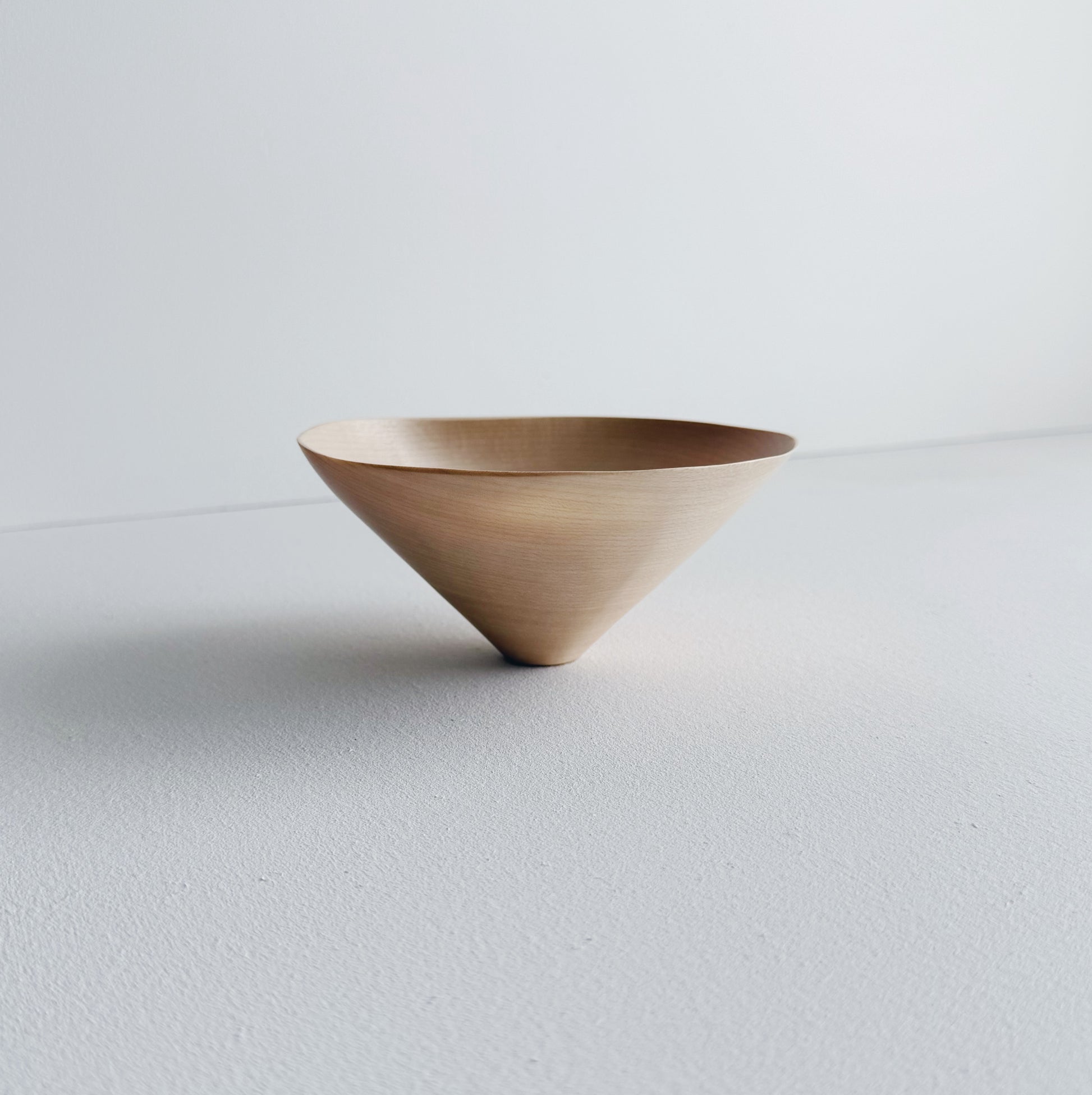 Conical sculptural bowl