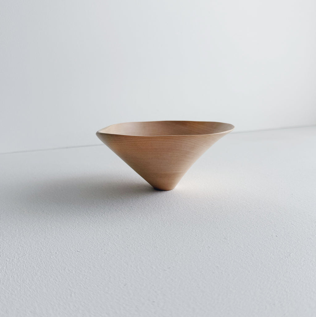 Conical sculptural bowl