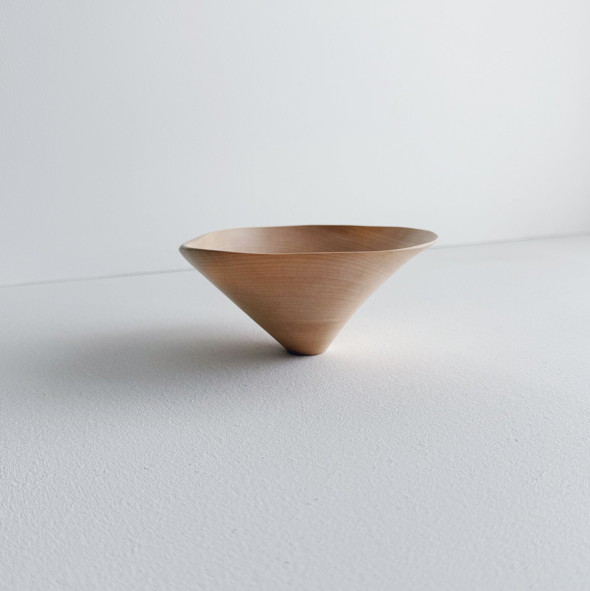 Conical sculptural bowl