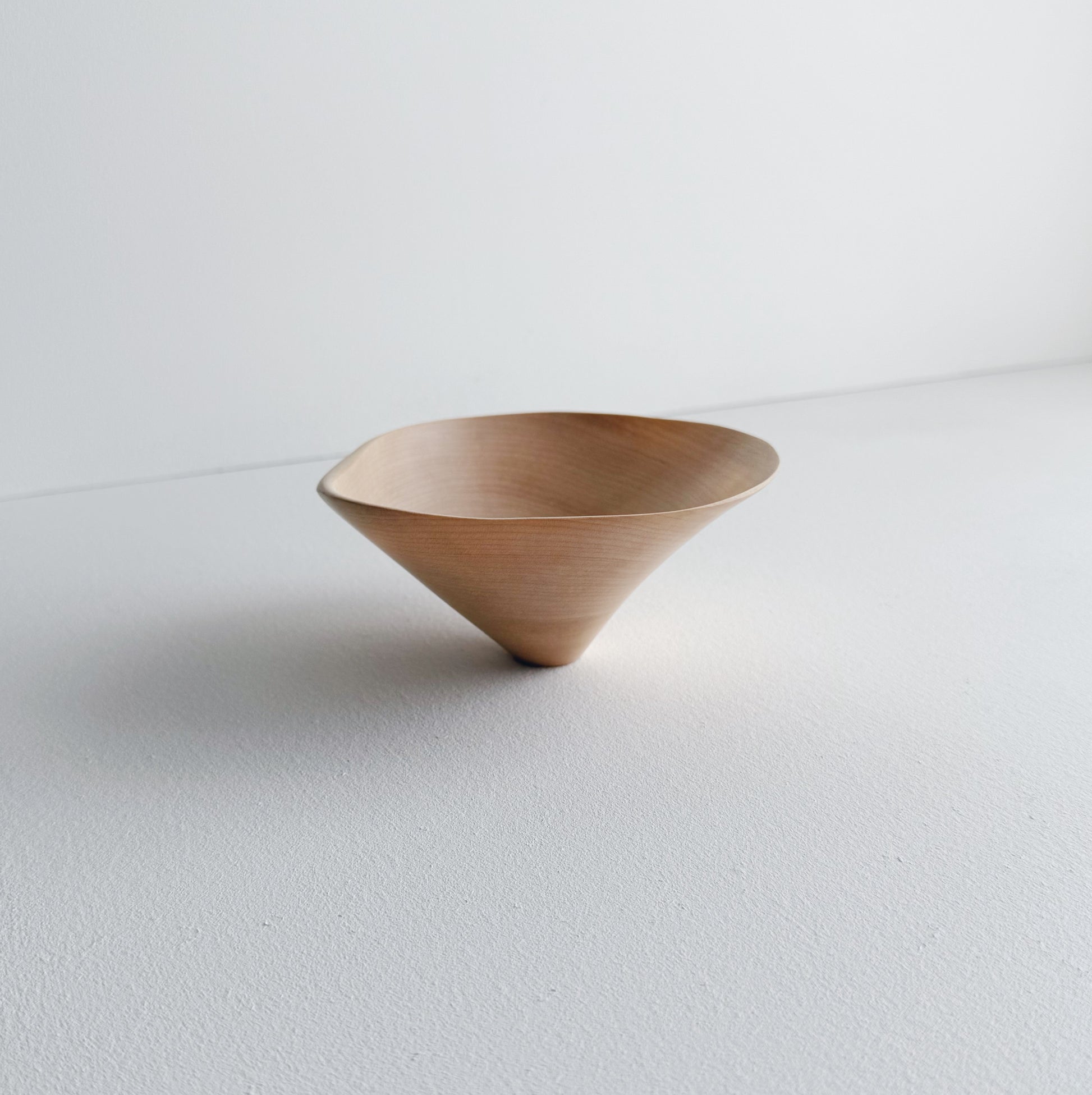 Conical sculptural bowl