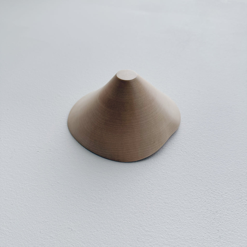 Conical sculptural bowl