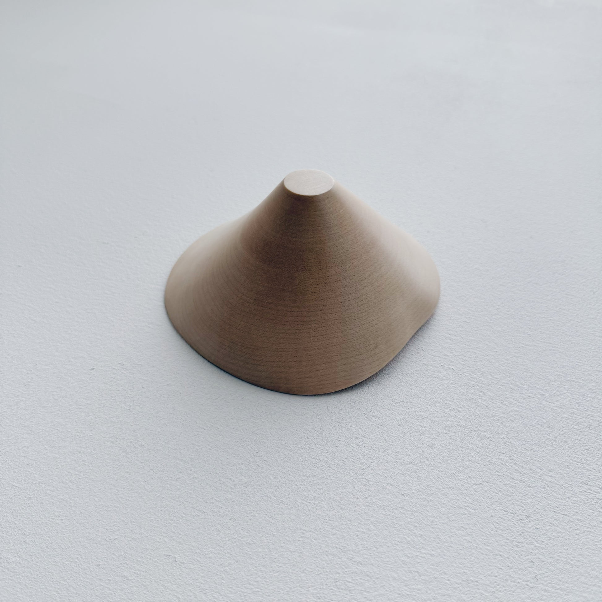Conical sculptural bowl
