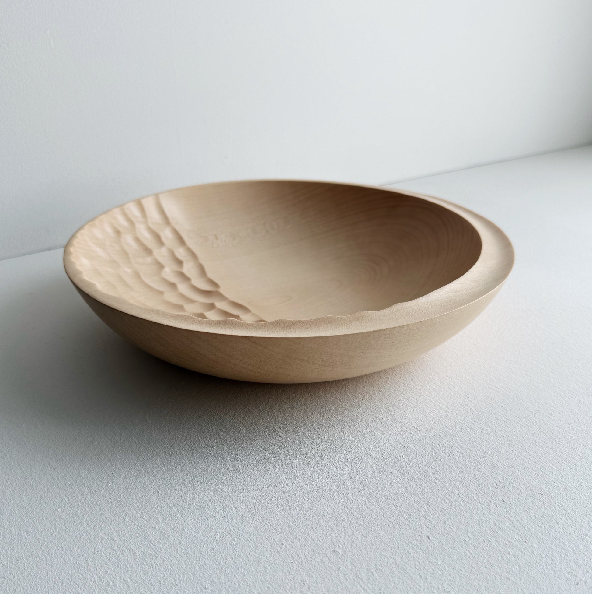 Cratered presentation bowl in sycamore