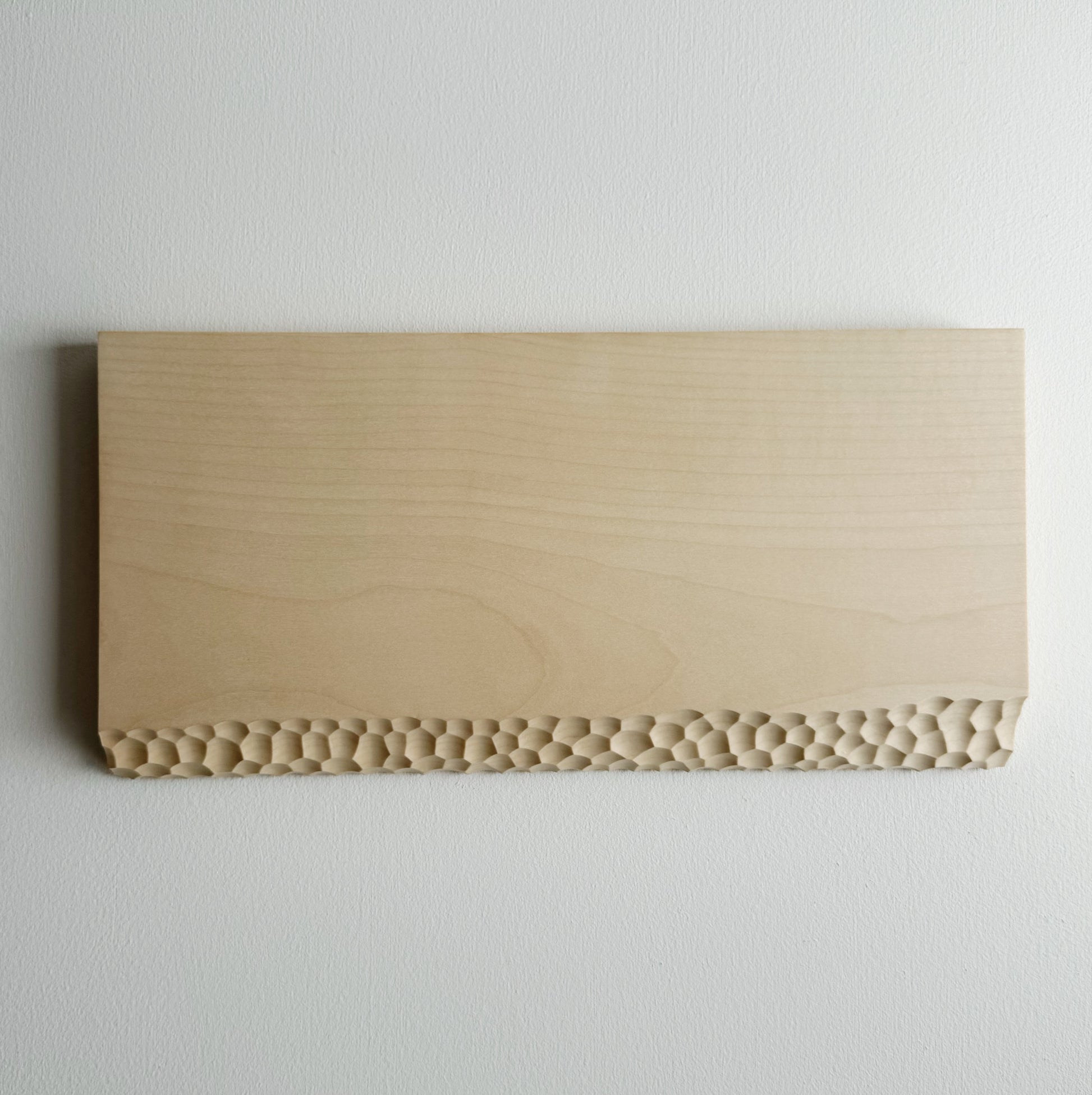 Sycamore wooden presentation board with crater edge on a white background