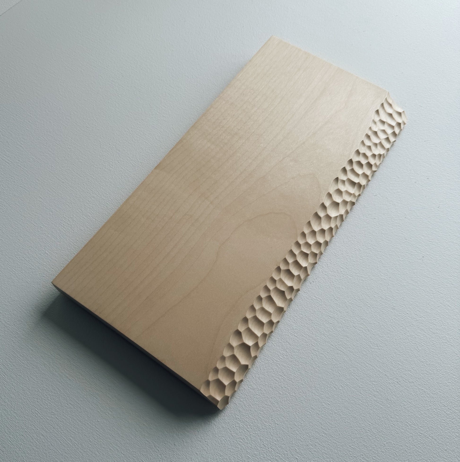 Sycamore wooden presentation board with crater edge on a white background