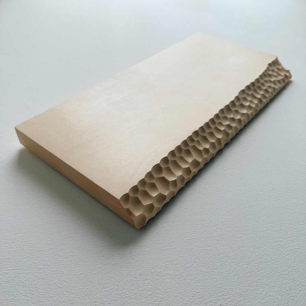 Sycamore wooden presentation board with crater edge on a white background