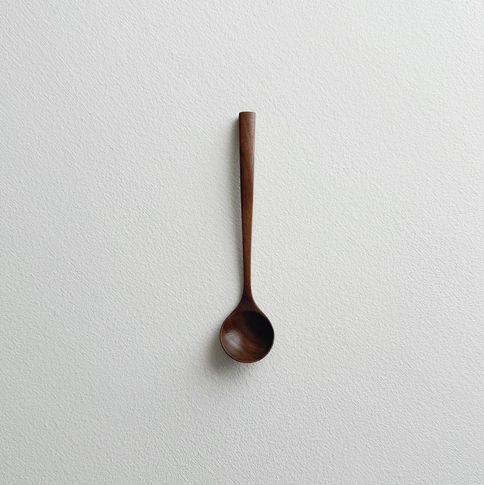 Small angled spoon in walnut