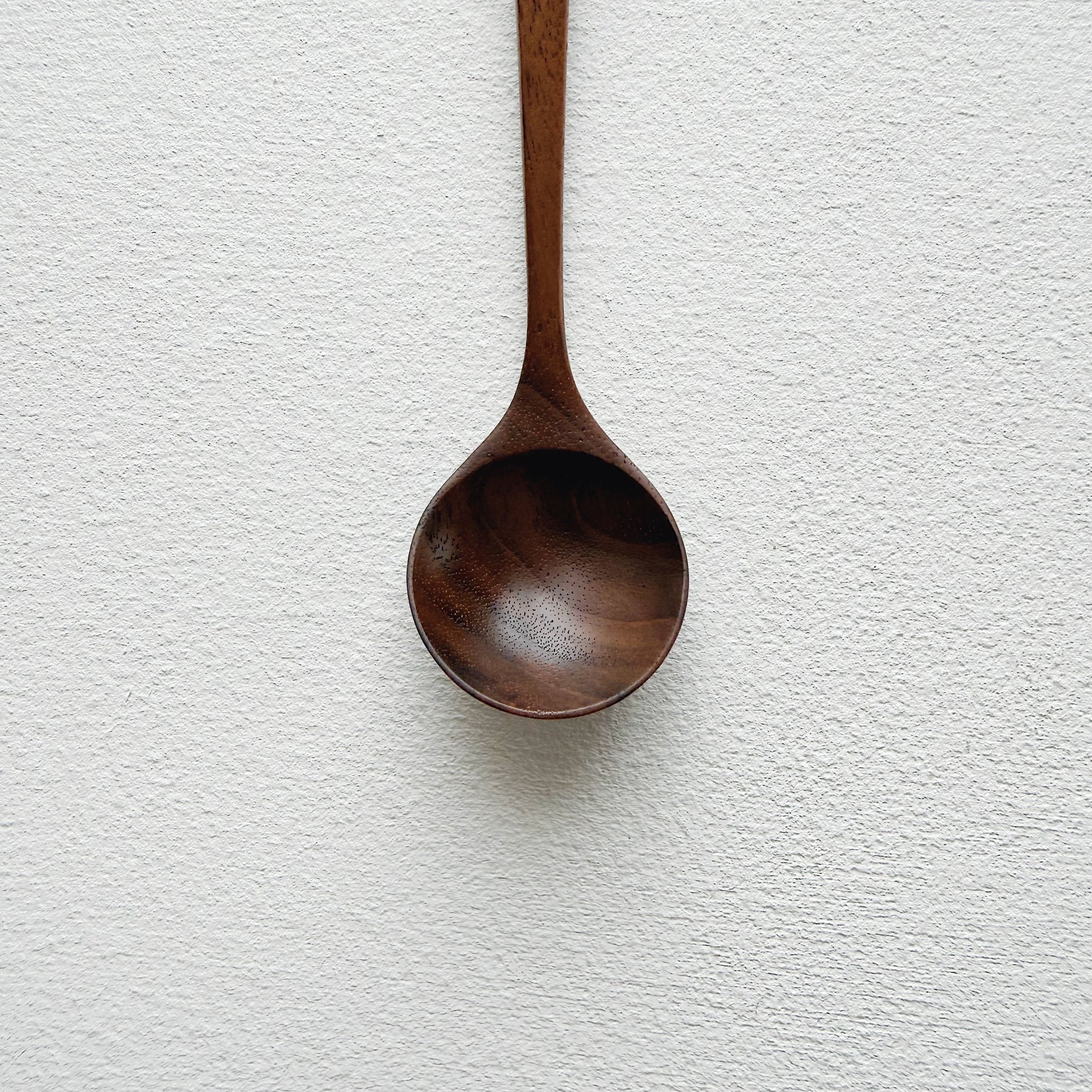 Small angled spoon in walnut