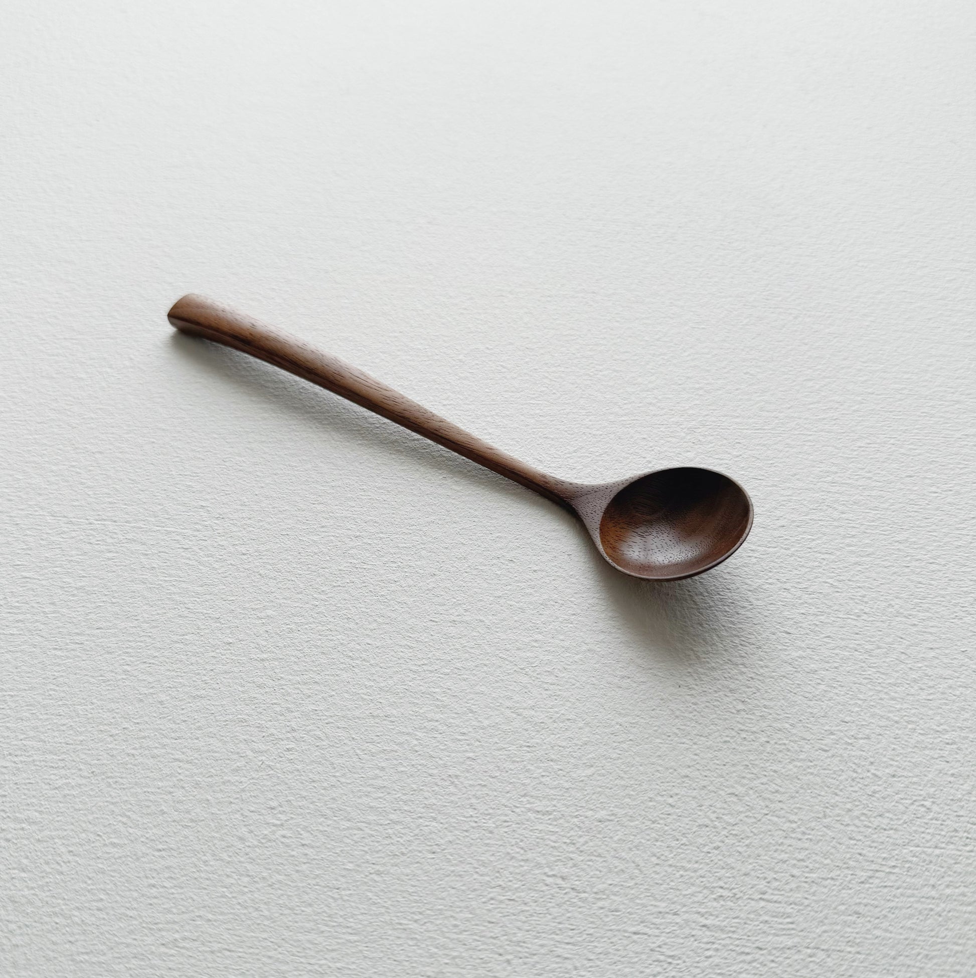 Small angled spoon in walnut