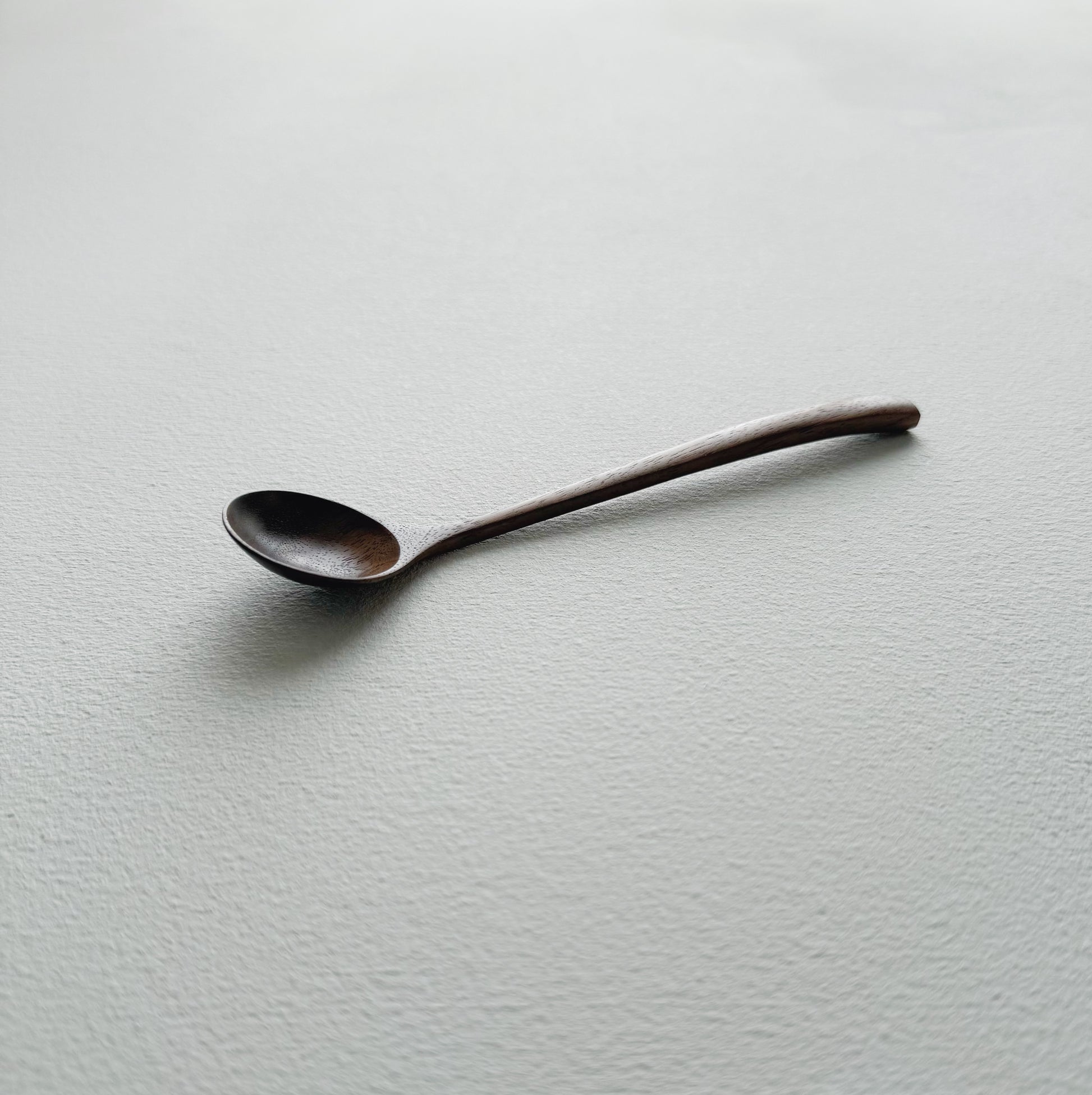 Small angled spoon in walnut