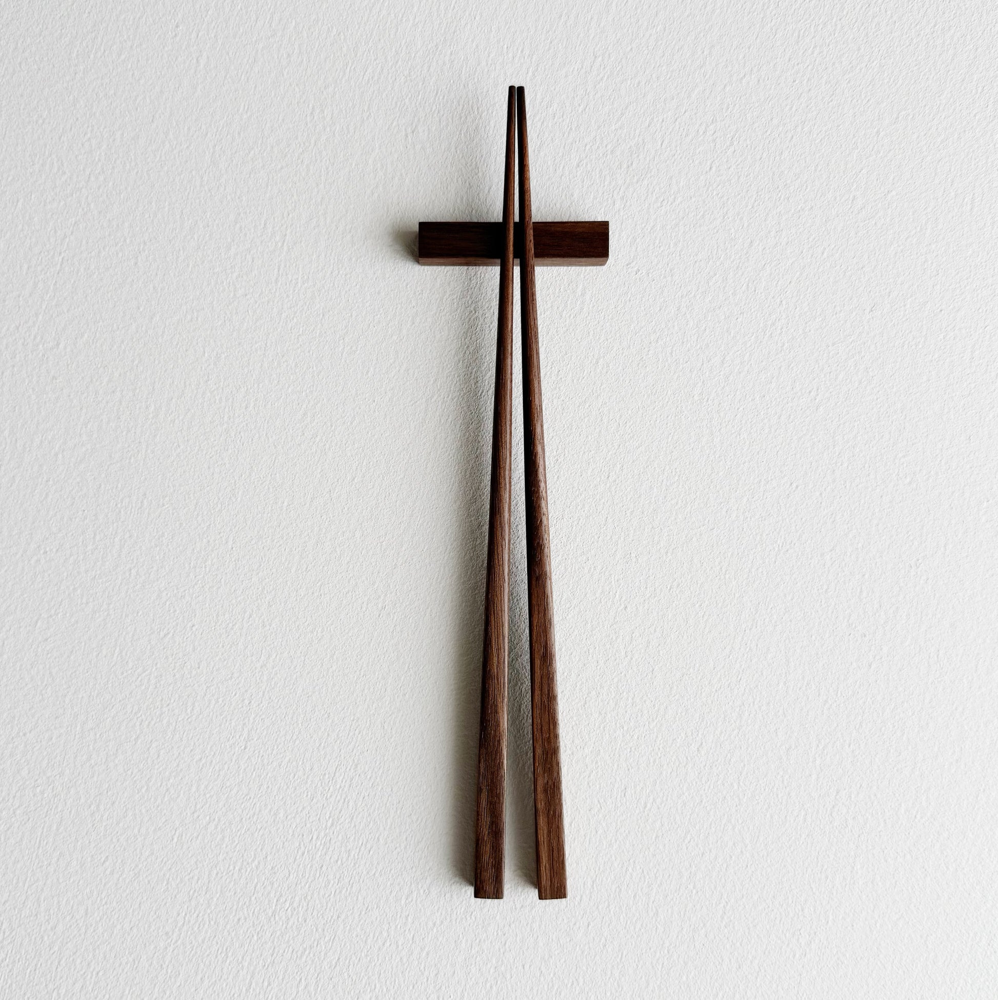Small squared chopsticks in walnut