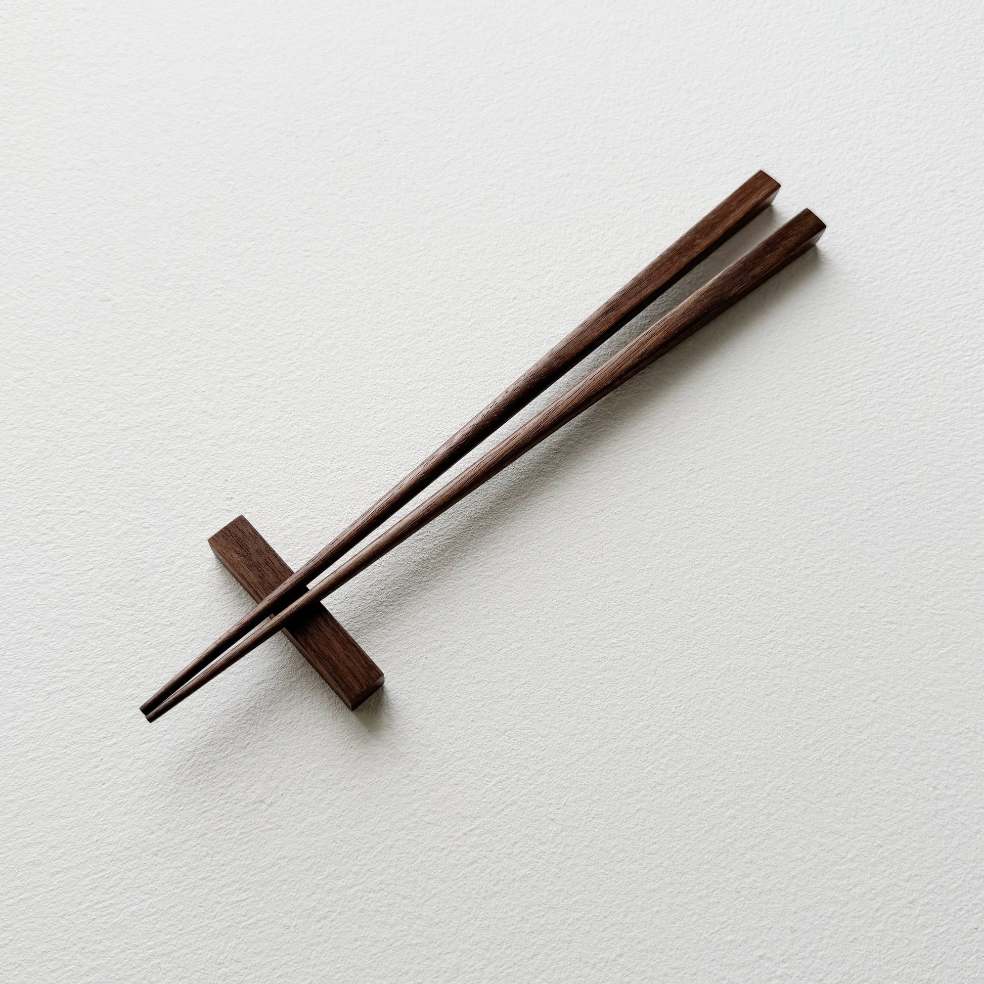 Small squared chopsticks in walnut