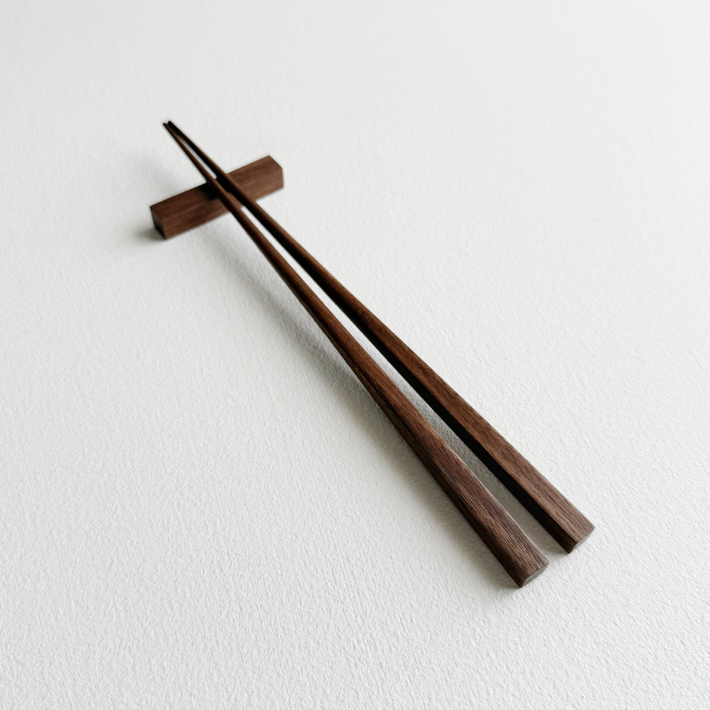 Small squared chopsticks in walnut
