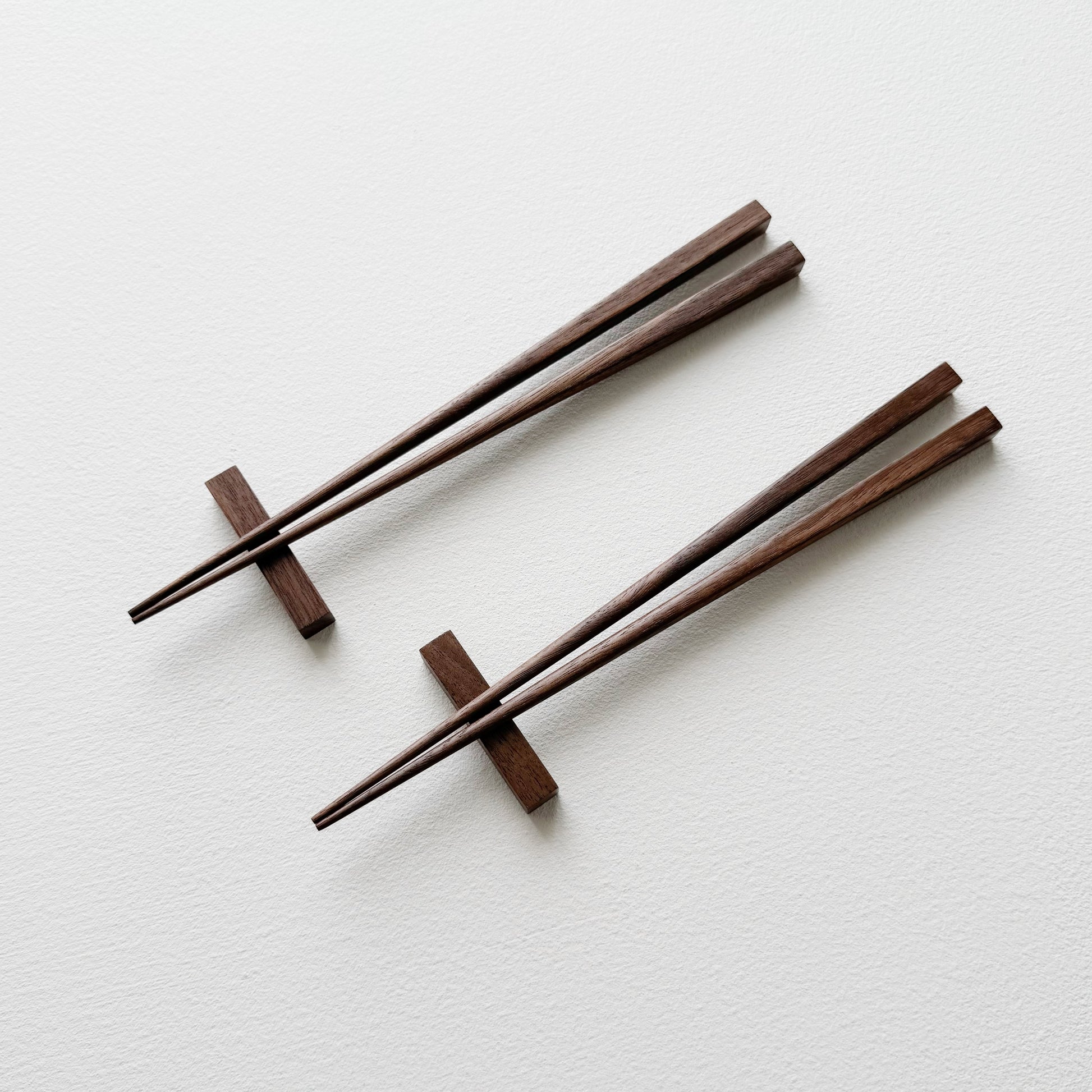 Small squared chopsticks in walnut