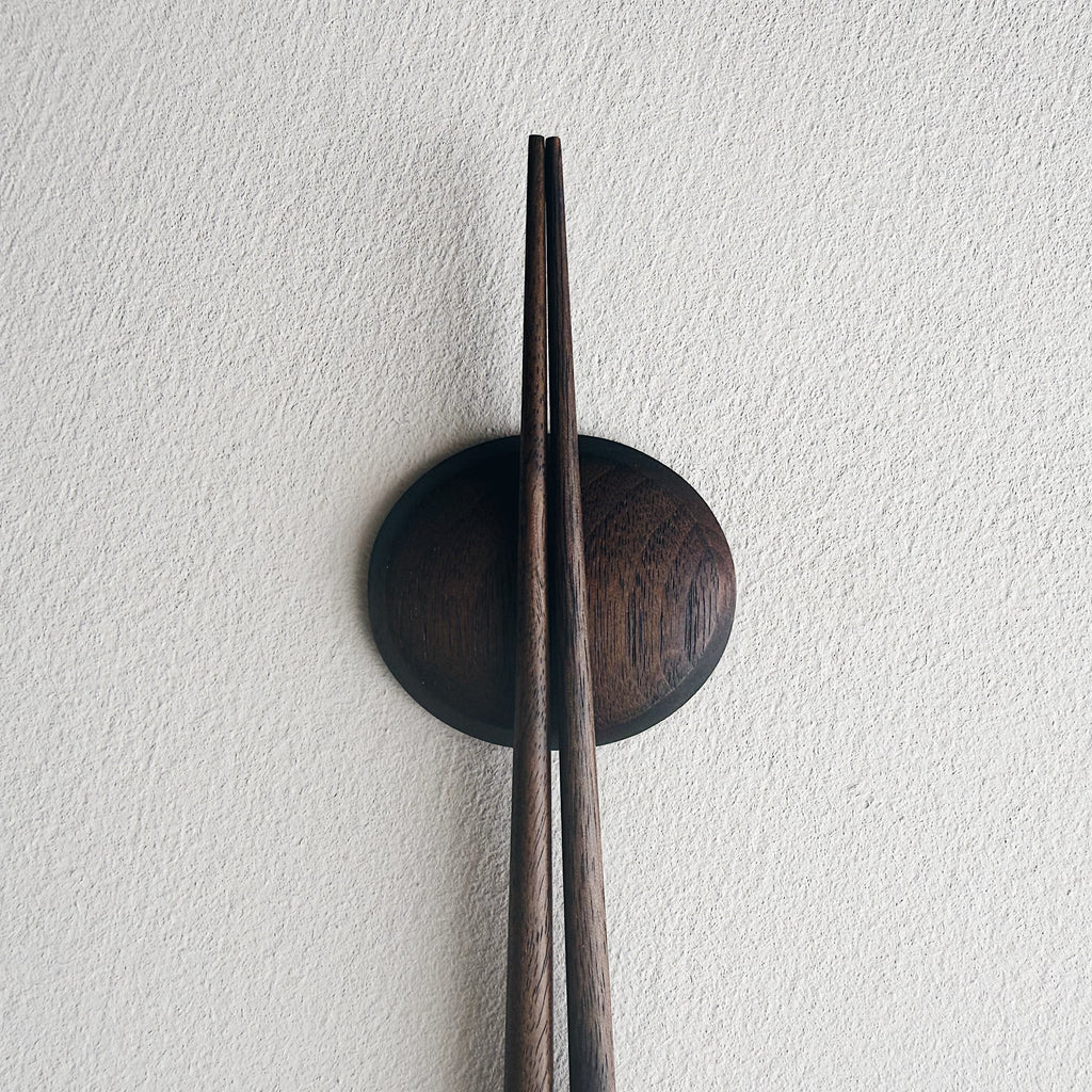 Small tapered chopsticks with pebble rest in vintage black walnut