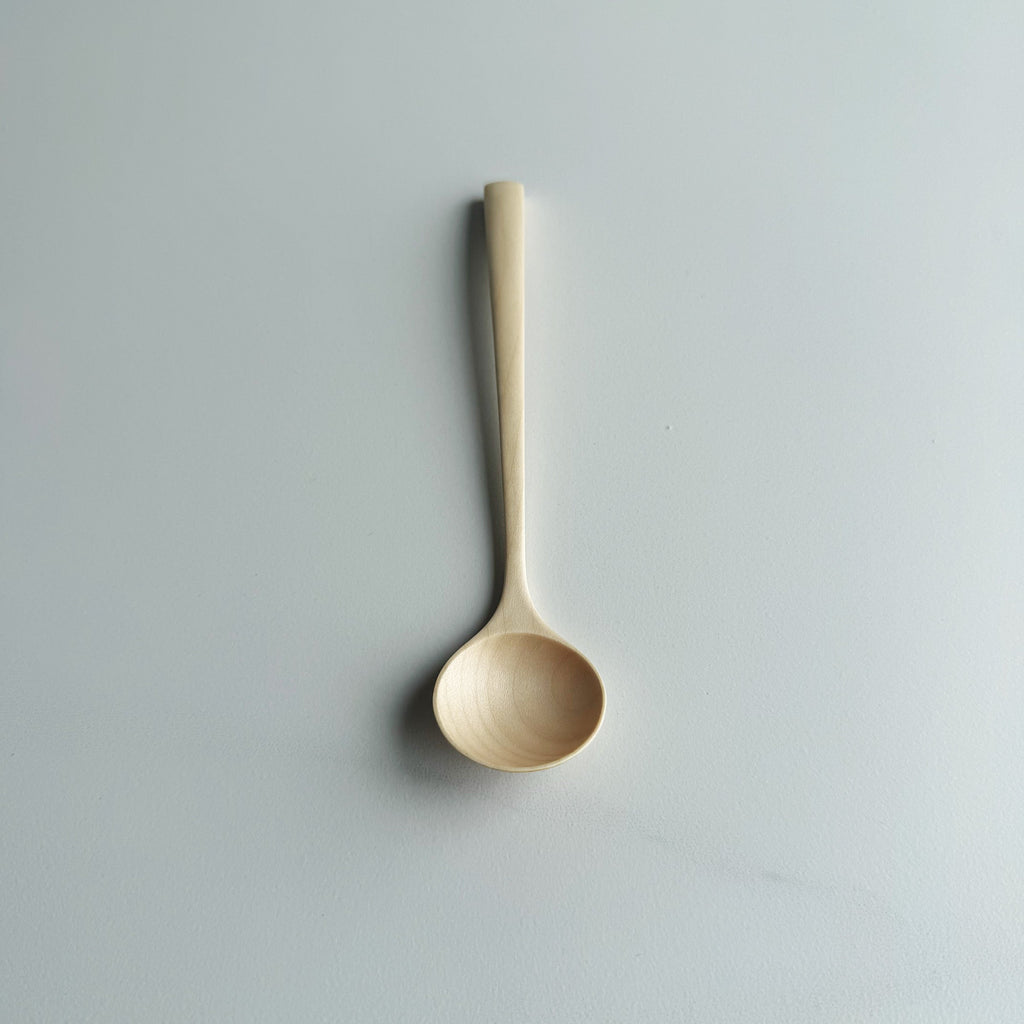 Small angled eating spoon in sycamore