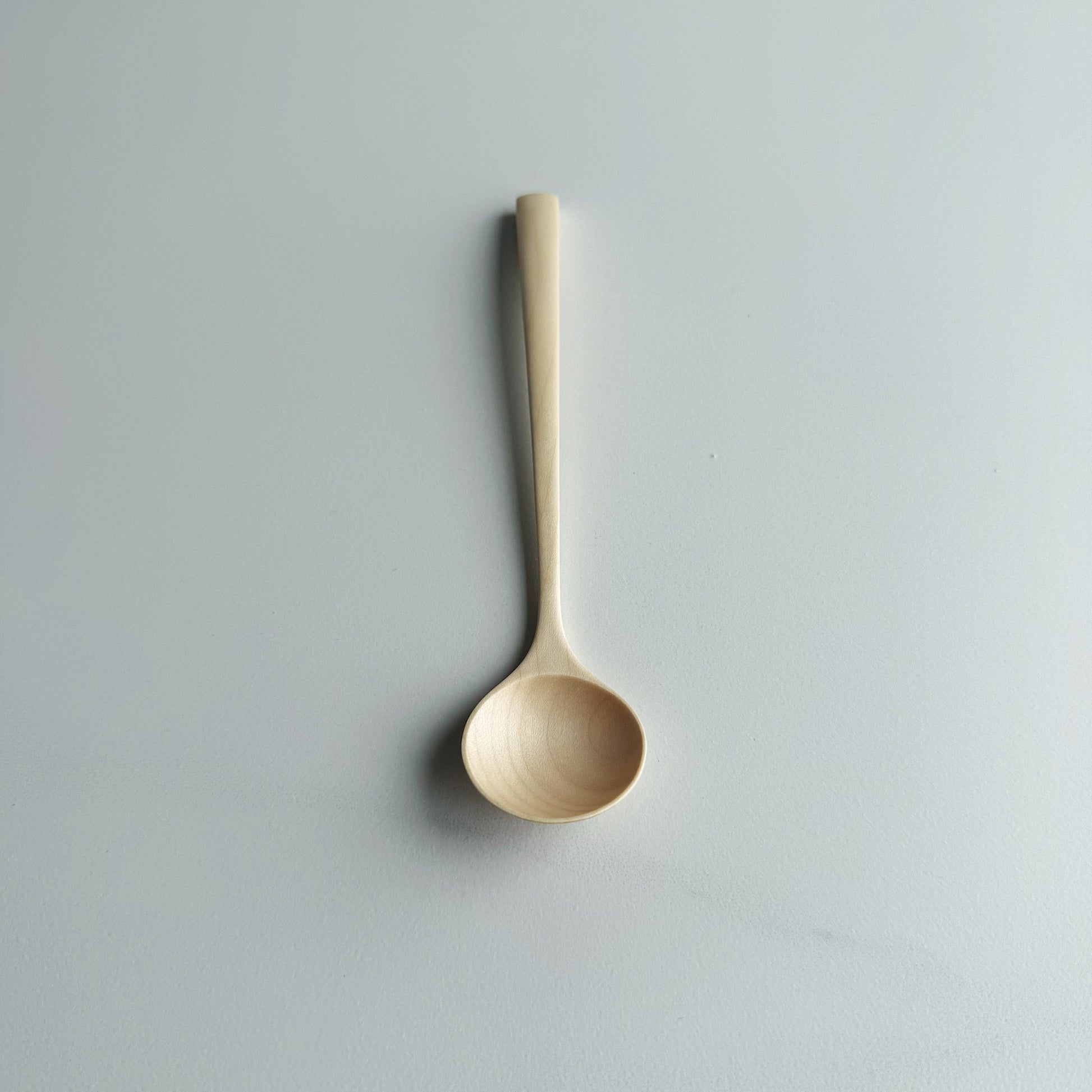 Small angled eating spoon in sycamore