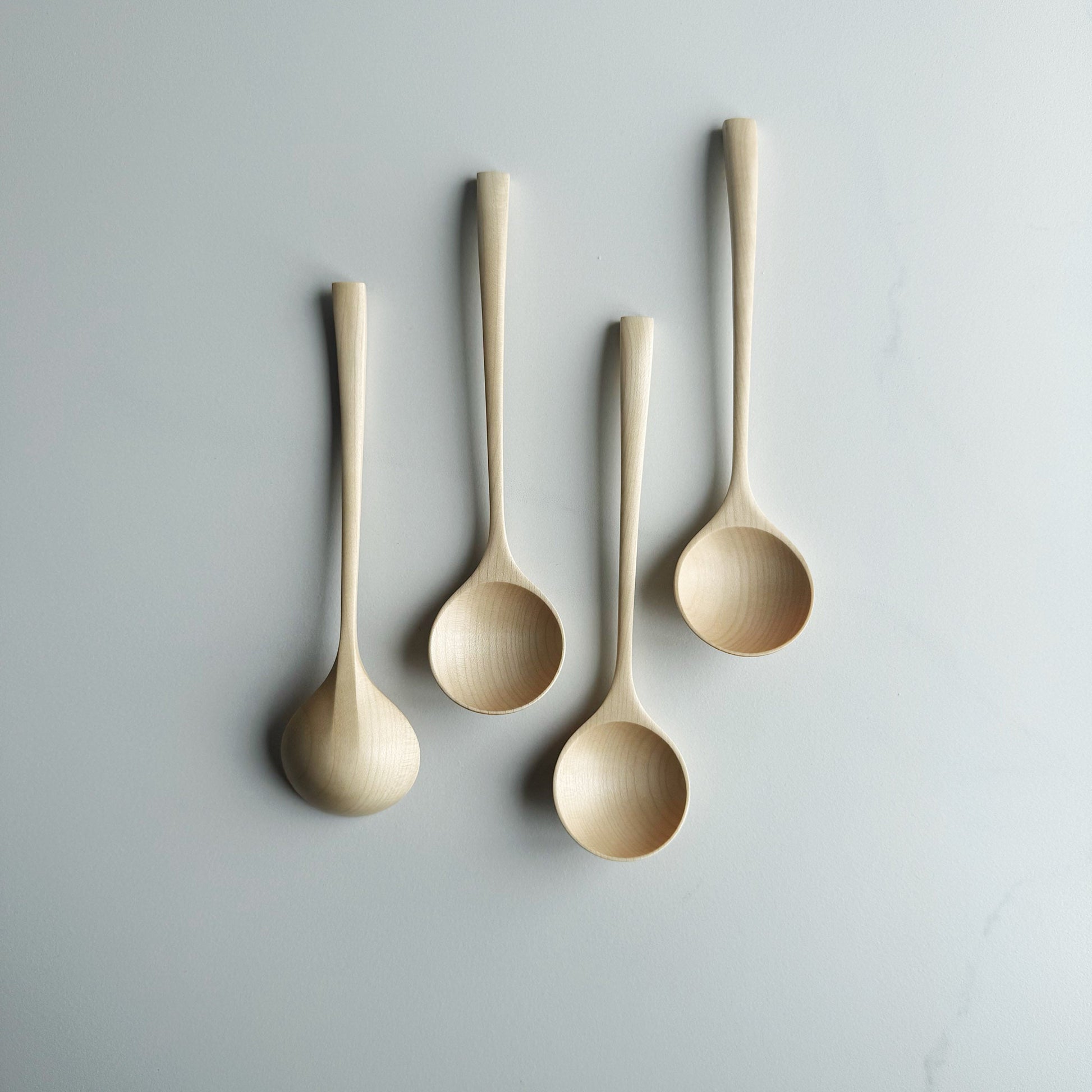 Small angled eating spoon in sycamore