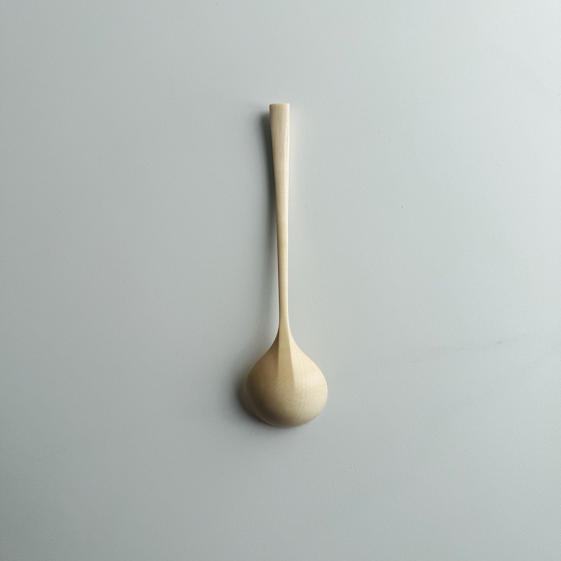 Small angled eating spoon in sycamore