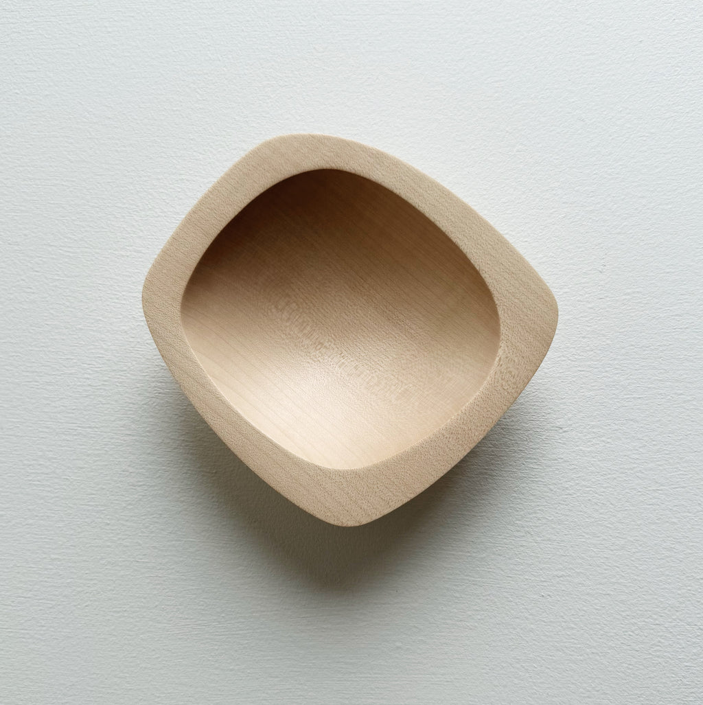 Squared sycamore bowl on a white background
