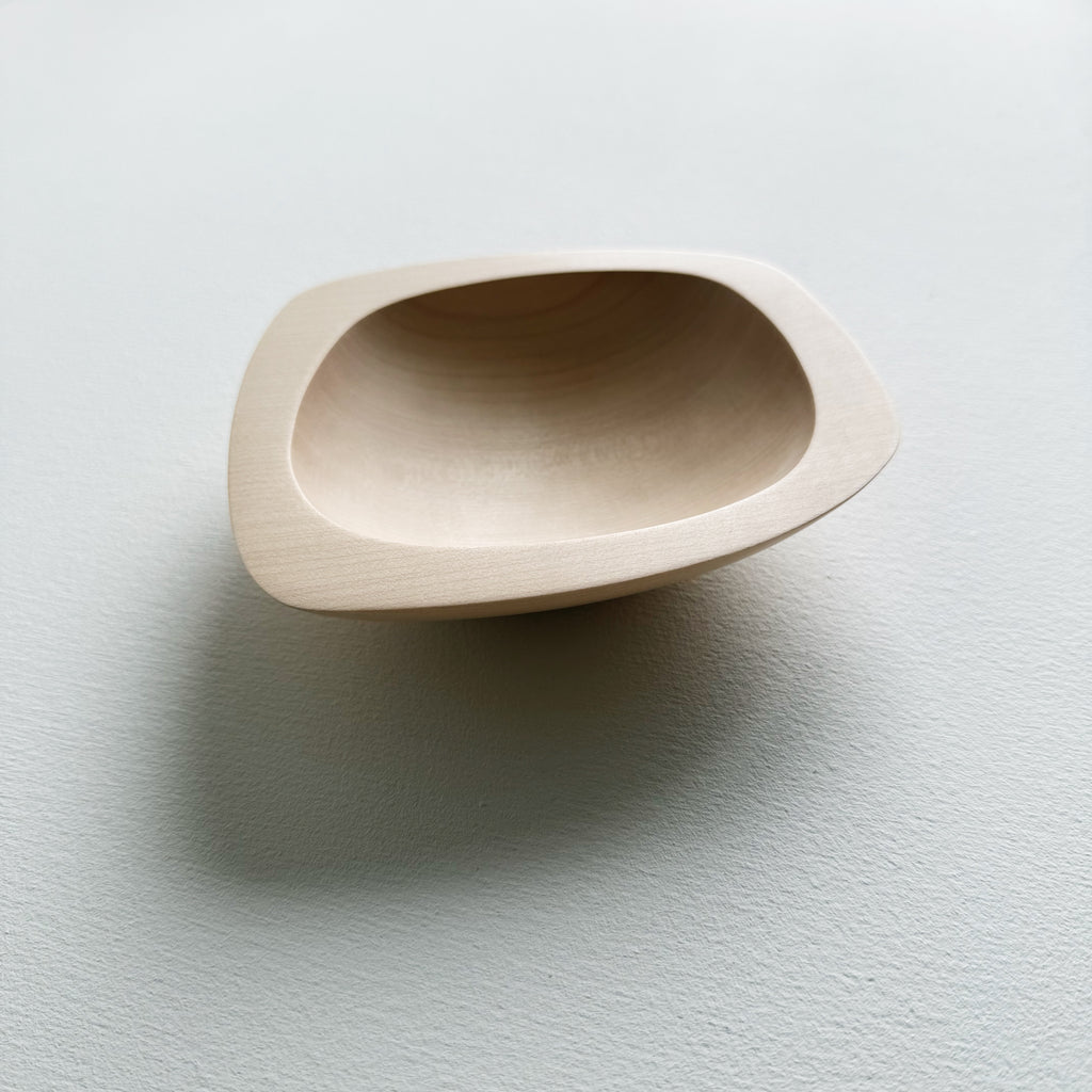 Squared sycamore bowl on a white background