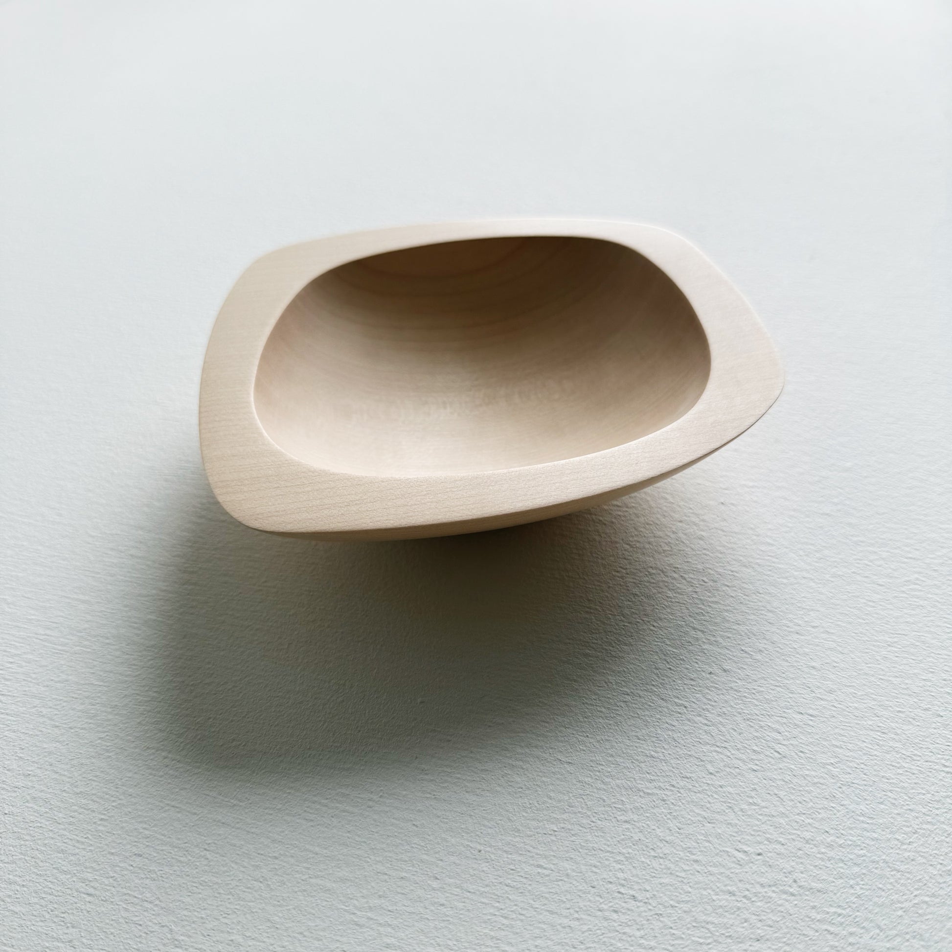 Squared sycamore bowl on a white background