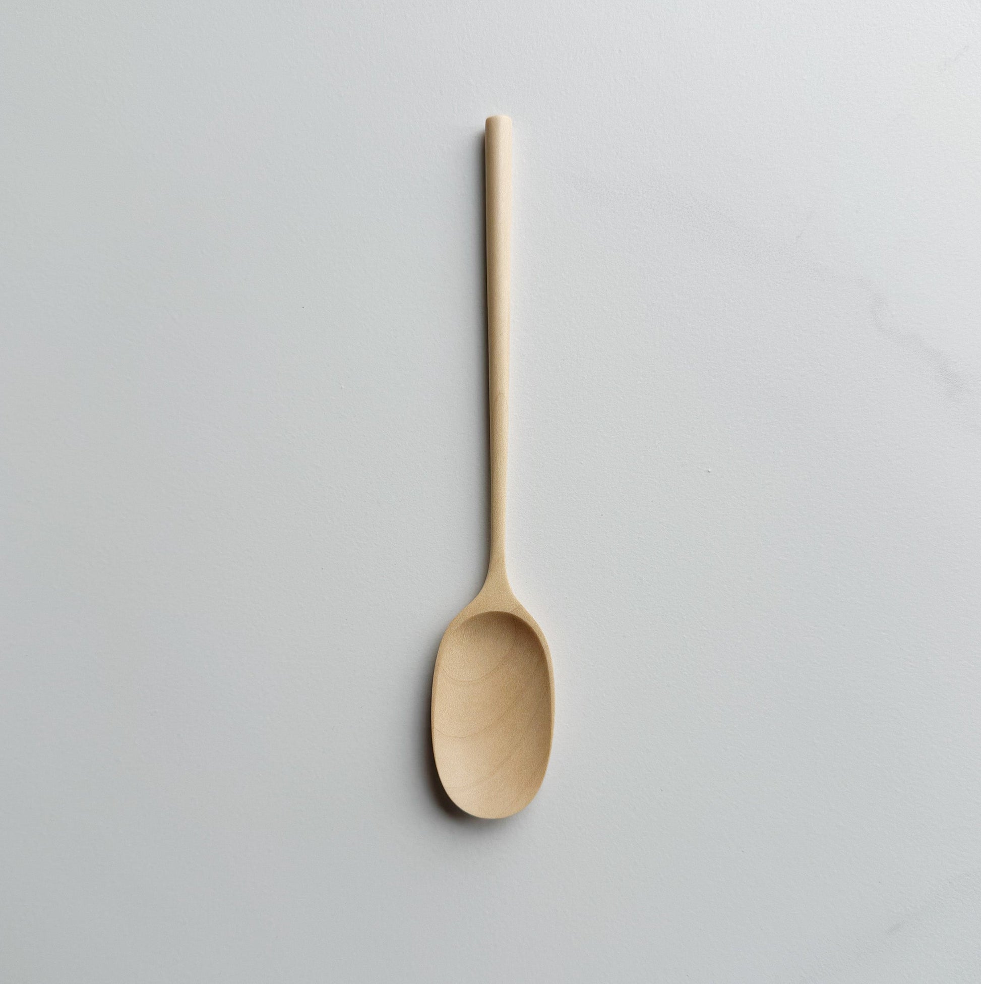 Sycamore small paddle spoon on a light background
