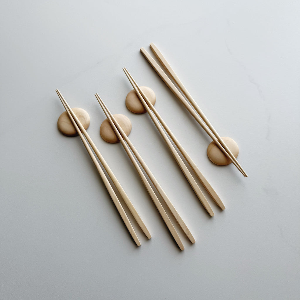 Tapered chopsticks & pebble rest in sycamore