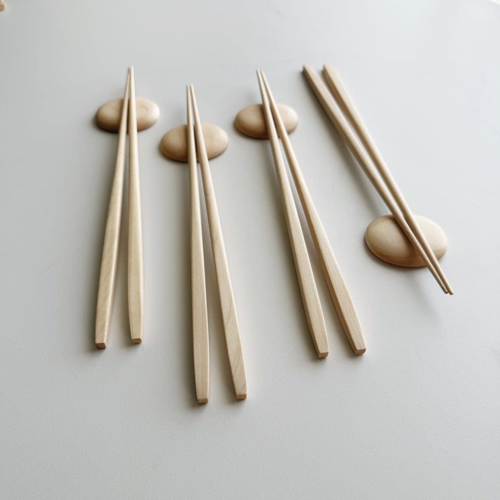 Tapered chopsticks & pebble rest in sycamore
