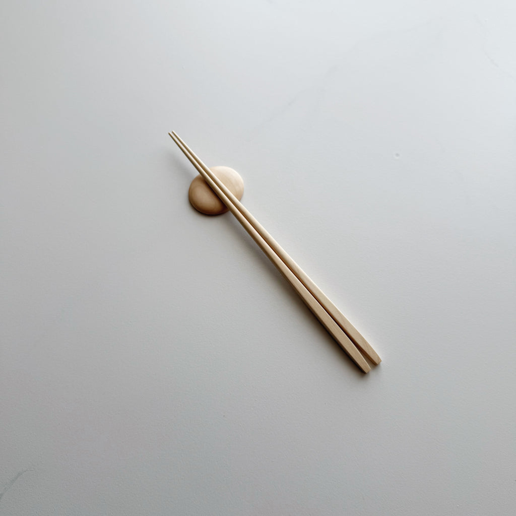 Tapered chopsticks & pebble rest in sycamore