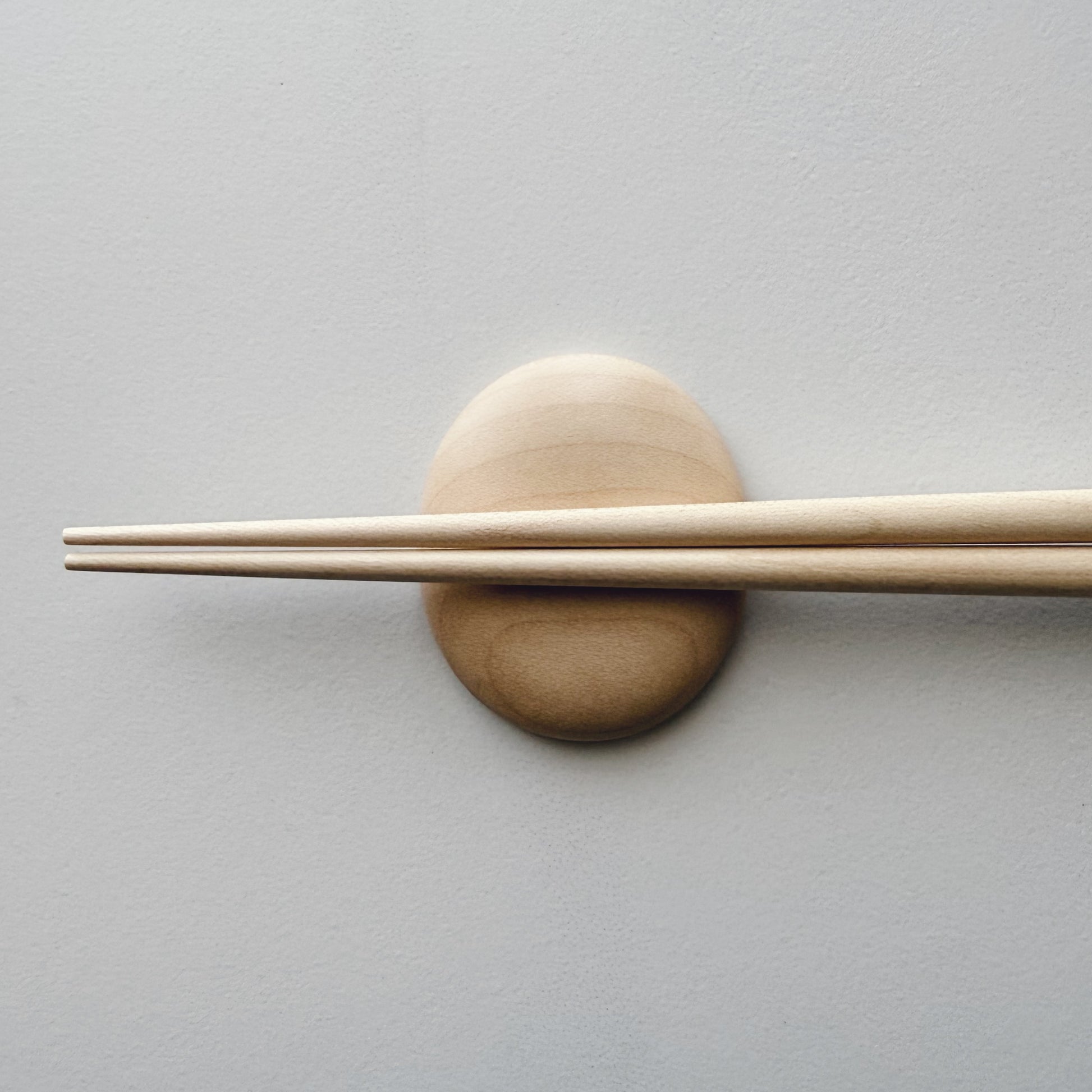 Tapered chopsticks & pebble rest in sycamore
