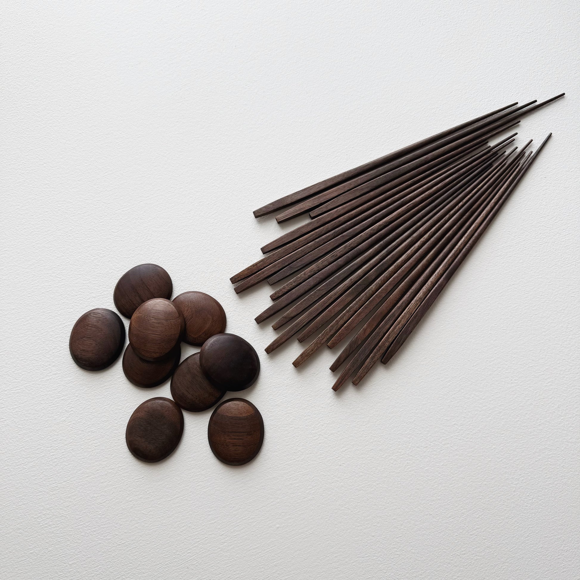 Tapered chopsticks with pebble rest in vintage black walnut