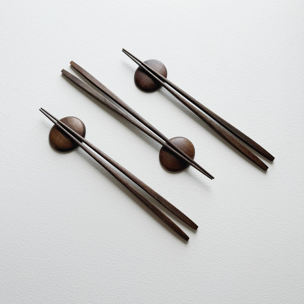 Tapered chopsticks with pebble rest in vintage black walnut