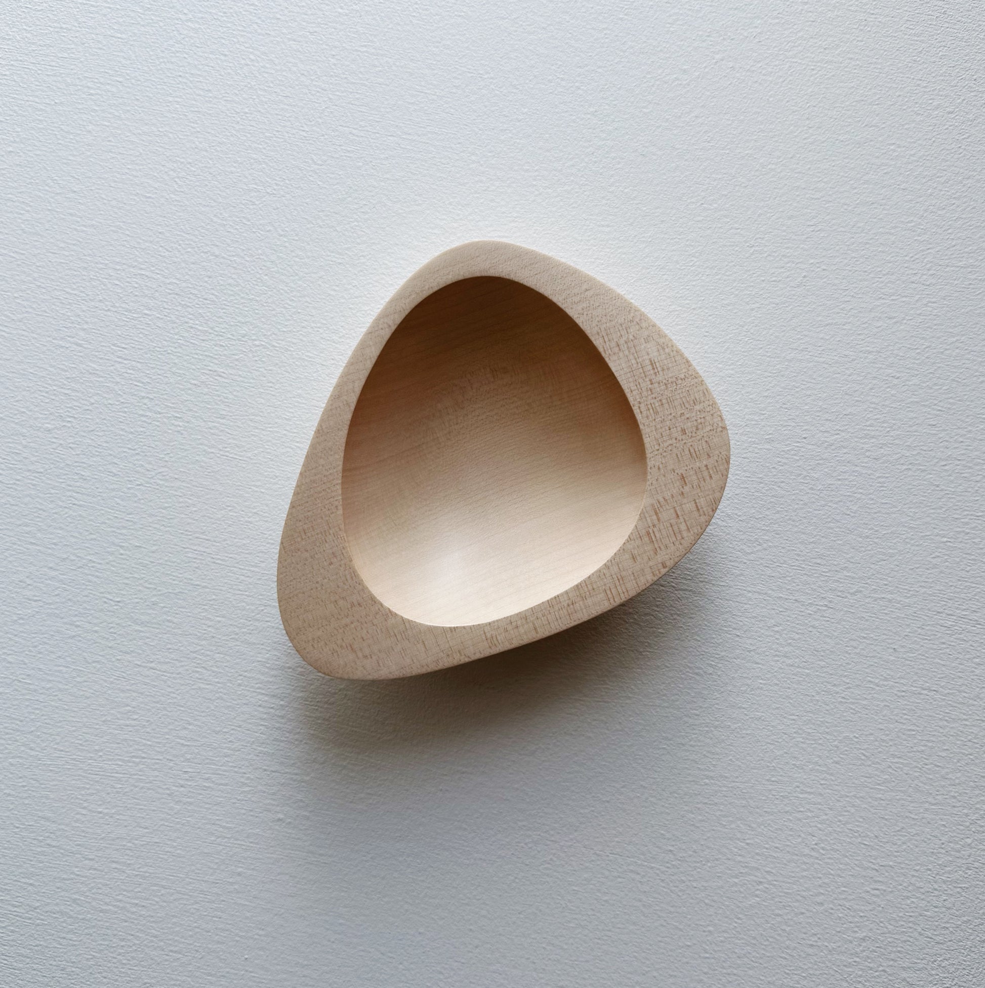 Triangular bowl in sycamore