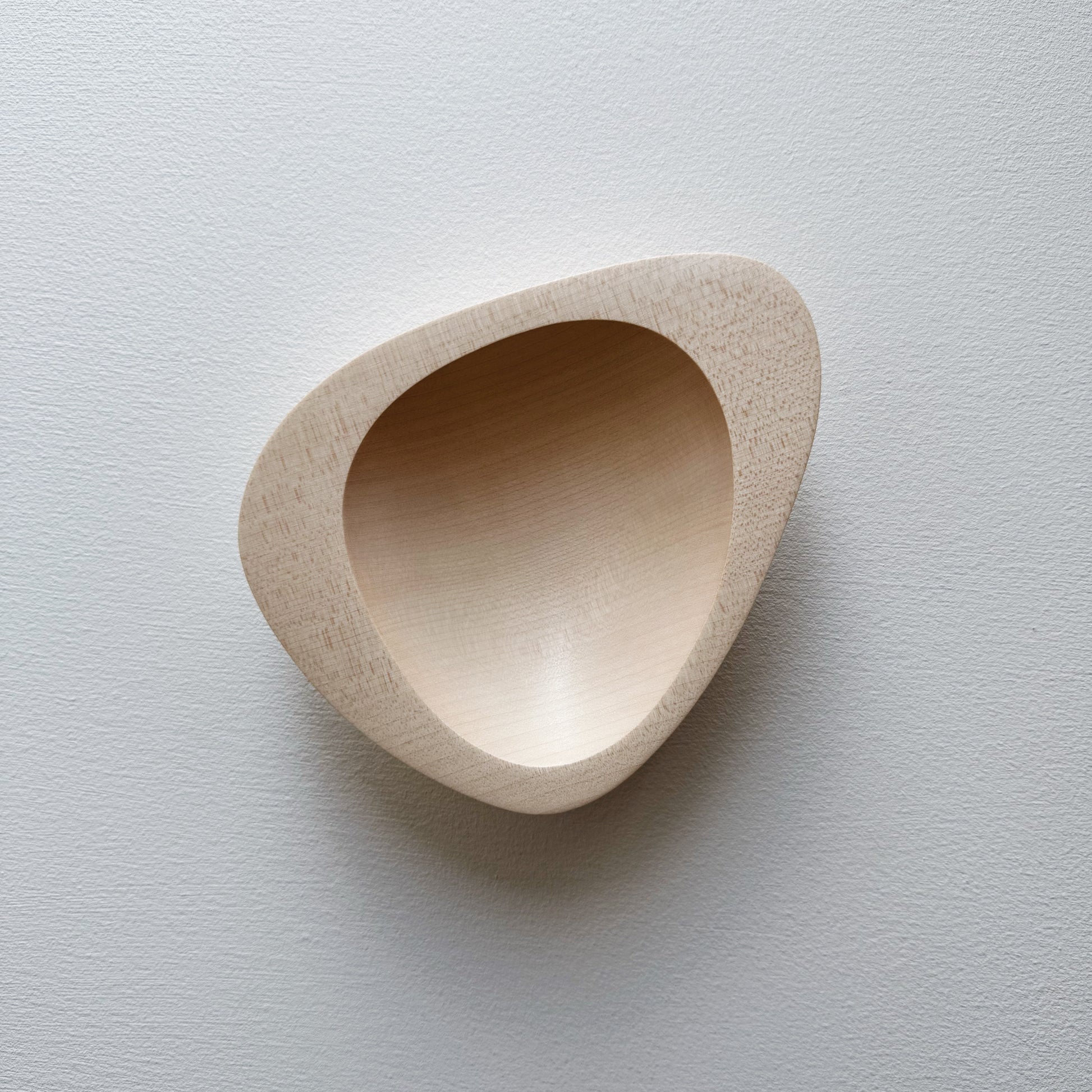 Triangular bowl in sycamore