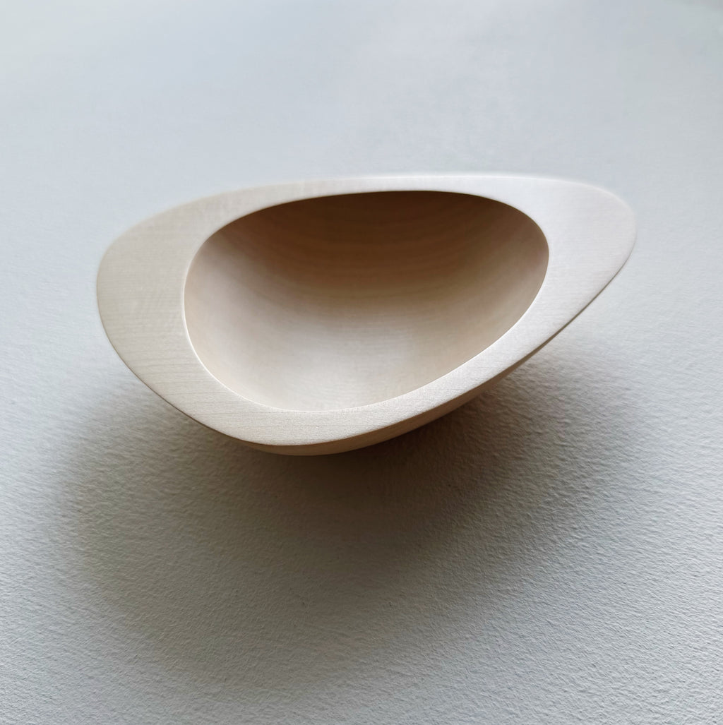 Triangular bowl in sycamore