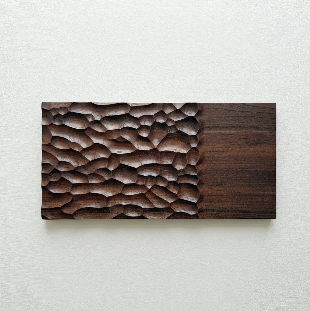Wide walnut presentation board on a white background
