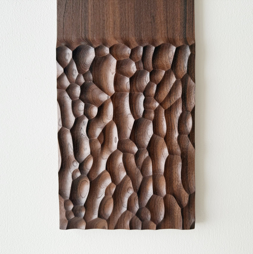 Wide walnut presentation board on a white background