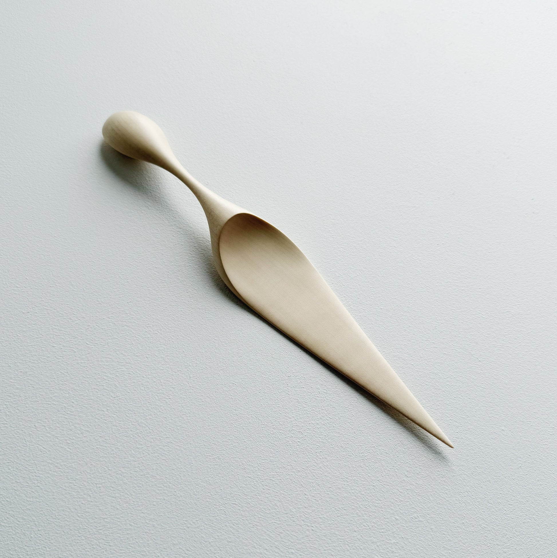 Sycamore cake server on a light background

