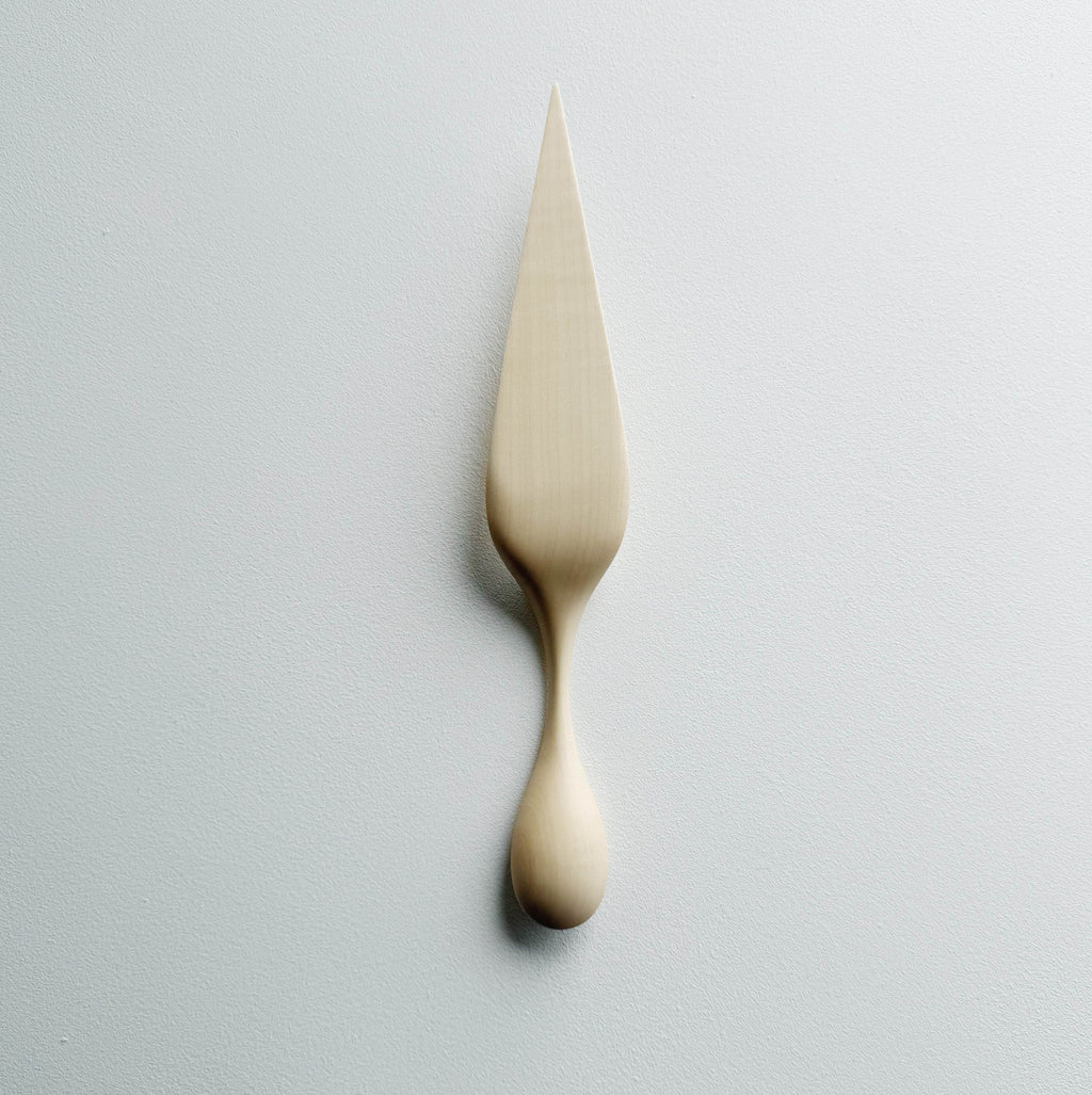 Sycamore cake server on a light background
