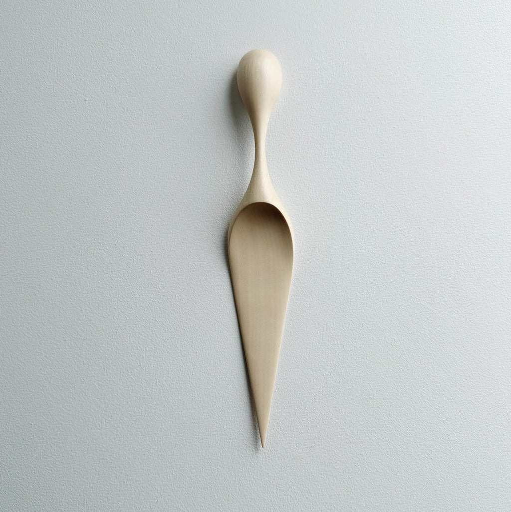 Sycamore cake server on a light background
