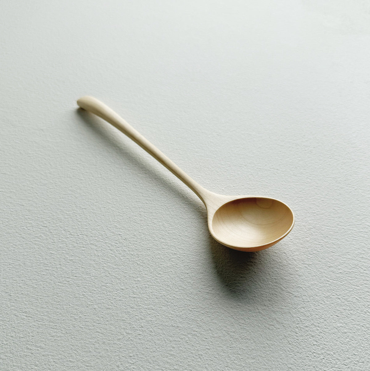 Large angled spoon in sycamore