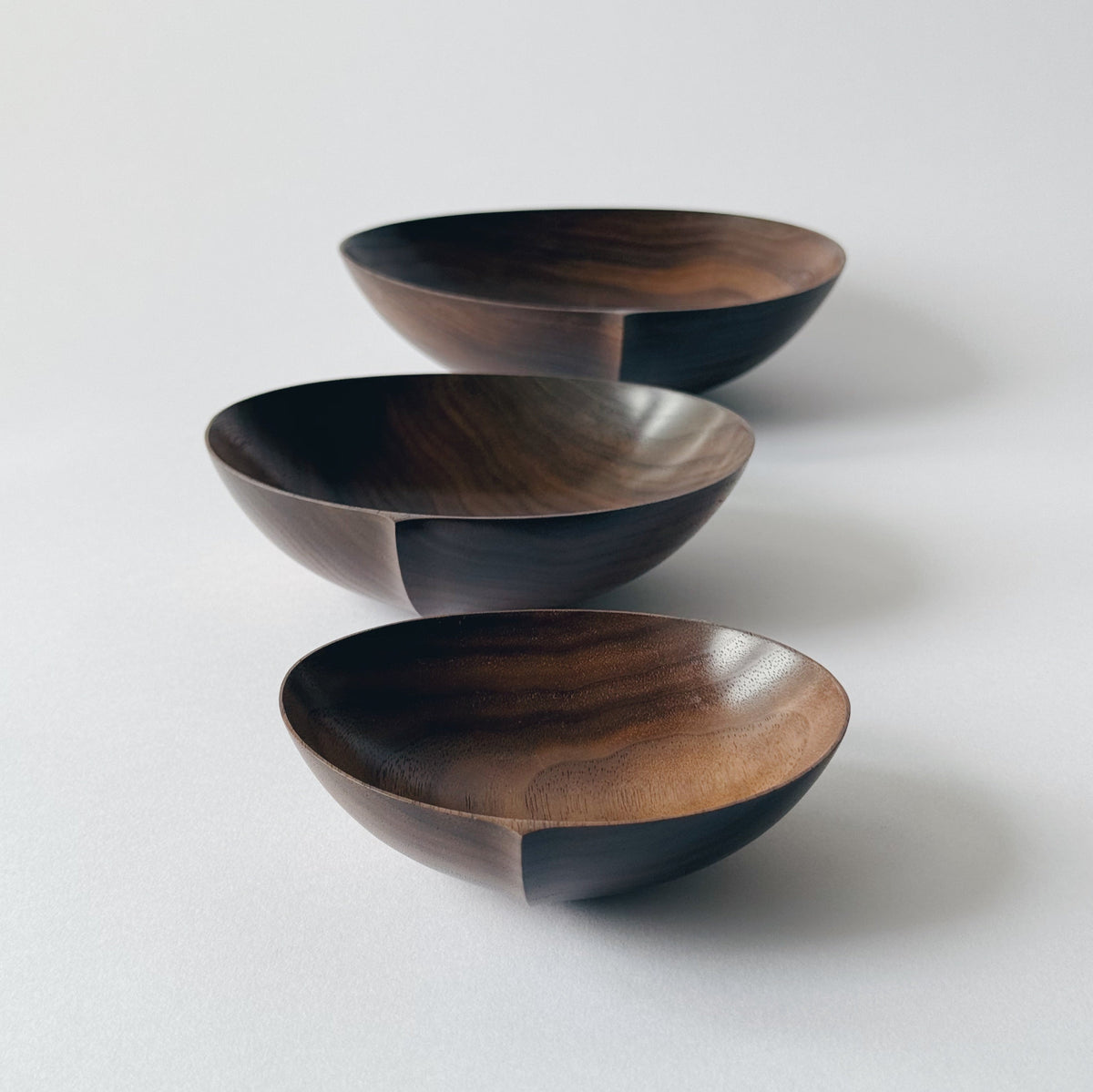 Oval nesting bowls in walnut - set of three