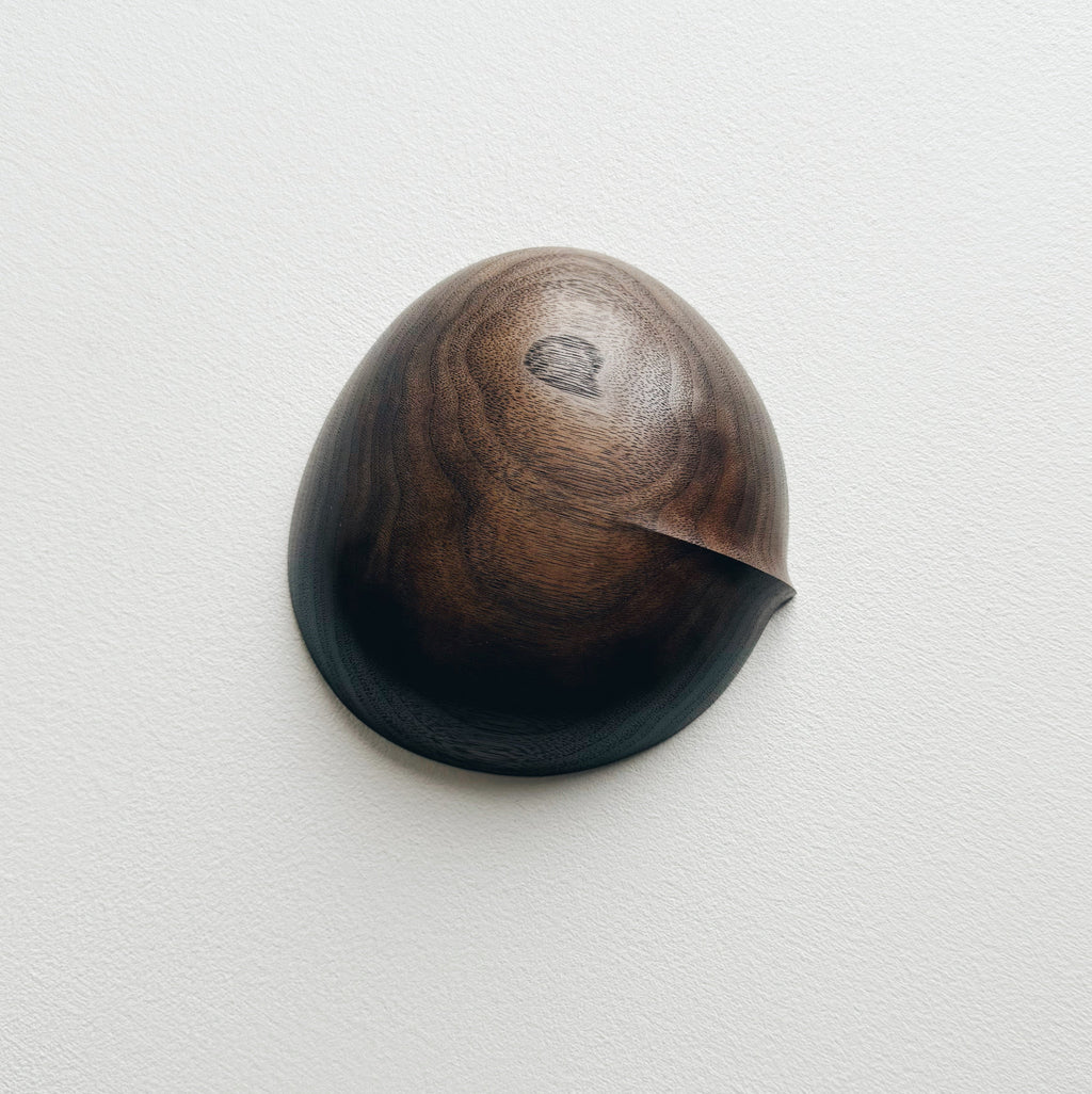 Oval palm bowl in vintage black walnut